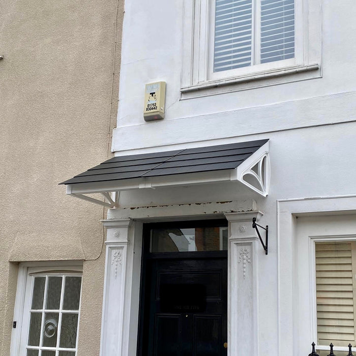 Affordable flat-packed door canopy with a lightweight yet durable design, perfect for cost-effective home upgrades.